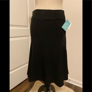 Aqua black skirt with flounced back hem. Size S